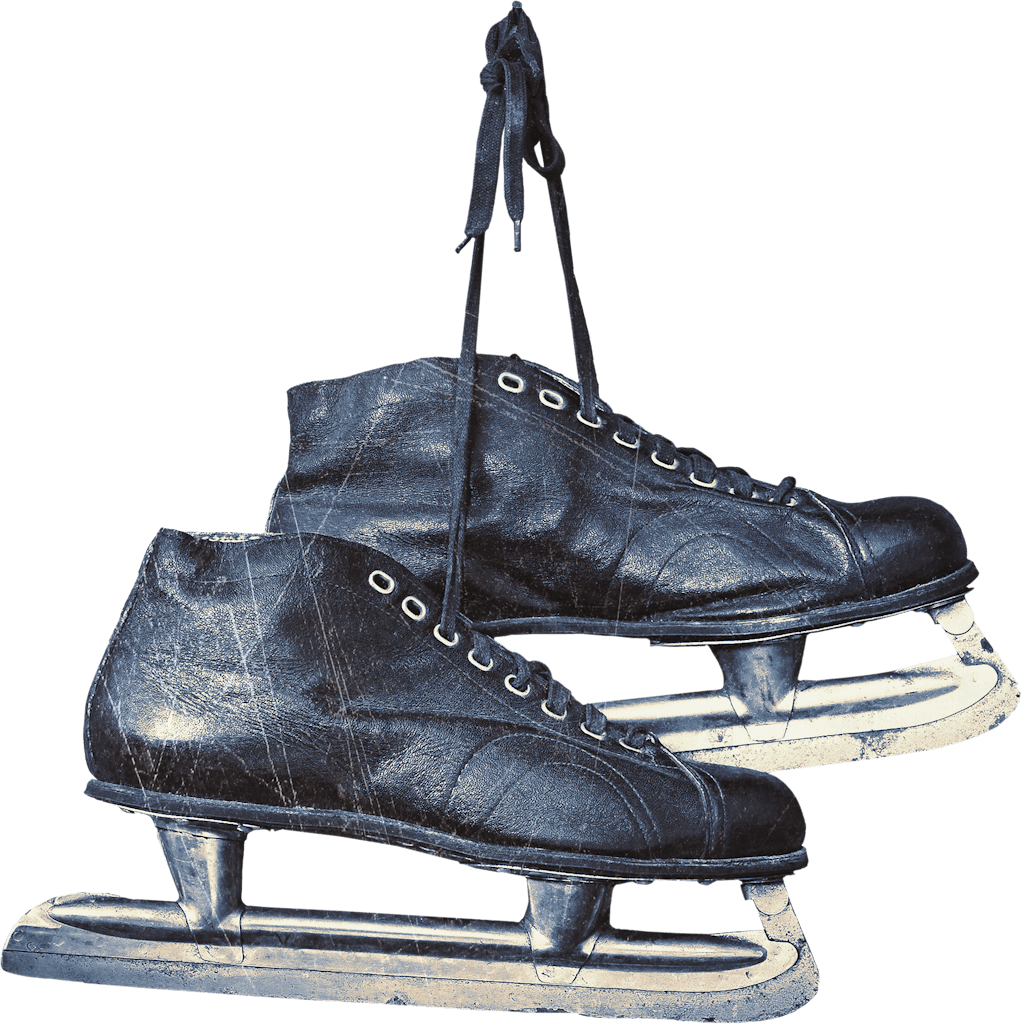 A pair of leather ice skates hung by their laces