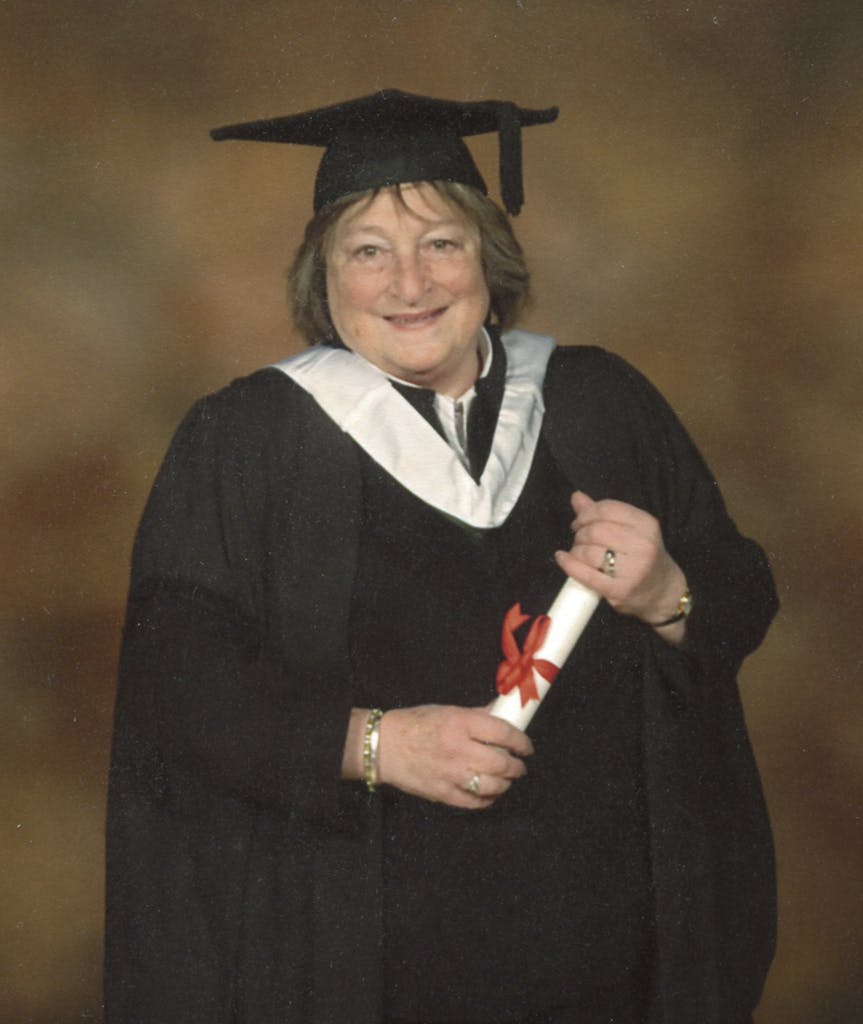 Iby wearing academic dress at her graduation in 2002